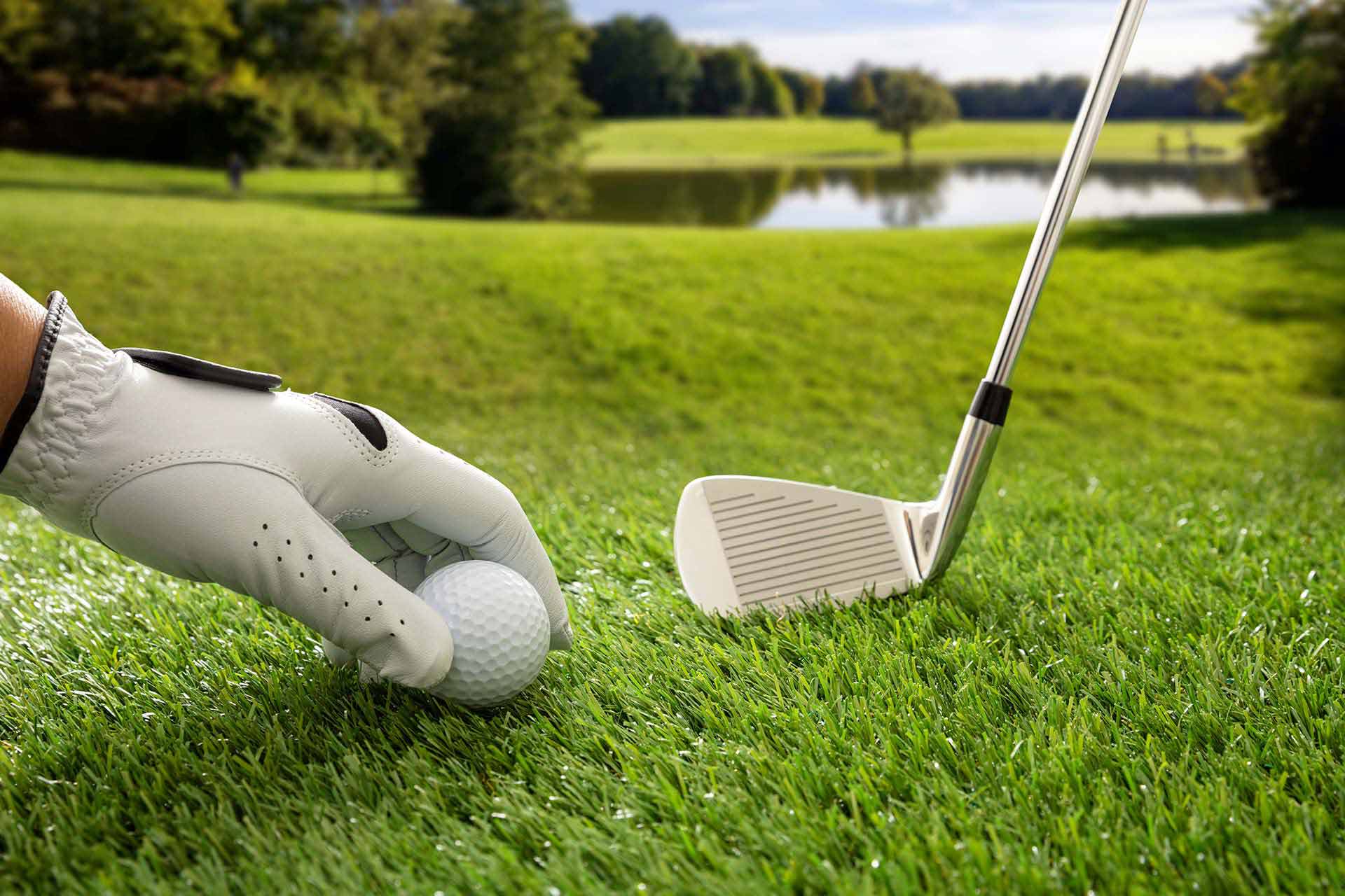 golfball-and-stick-on-green-grass-golf-course